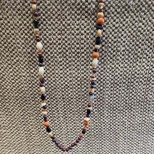 Multicolored Beaded Artisan Necklace with Warm Tones - Feather Toggle Clasp
